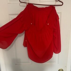 Off the shoulder red shirt
